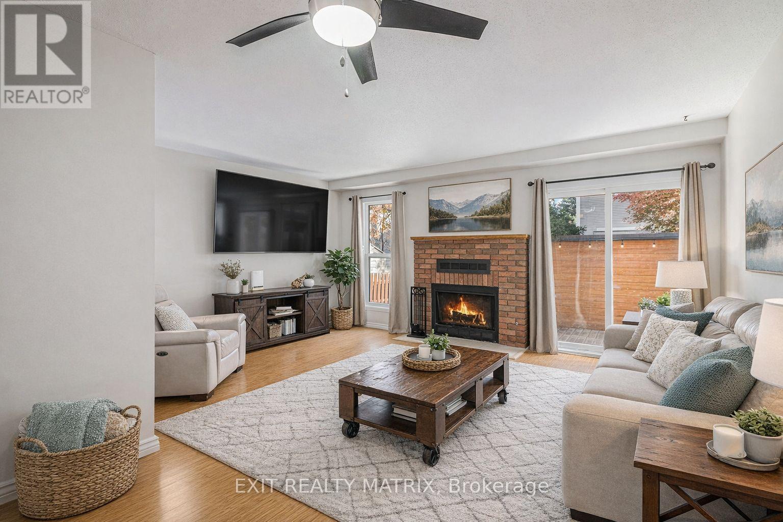 1432 Deavy Way, Ottawa, ON - Indoor Photo Showing Living Room With Fireplace