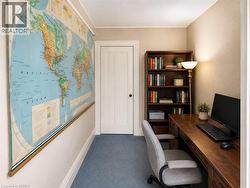 Built-in wood shelving provides plenty of practical storage while adding warmth and character to the space. - 