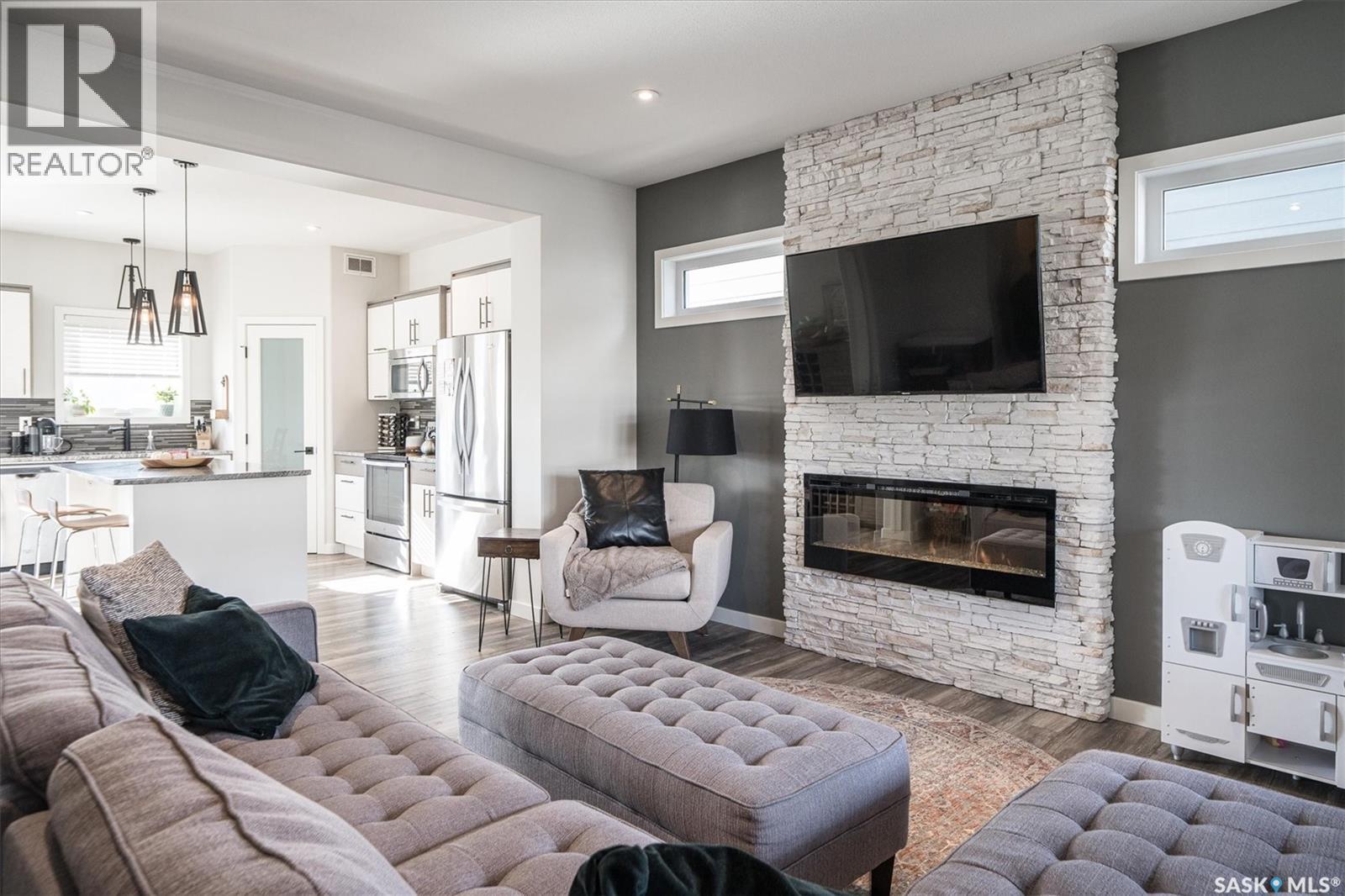 359 Marlatte Street, Saskatoon, SK - Indoor Photo Showing Living Room With Fireplace