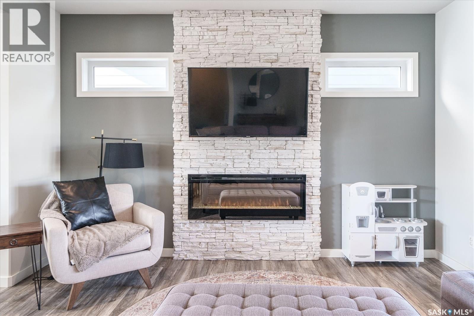 359 Marlatte Street, Saskatoon, SK - Indoor Photo Showing Living Room With Fireplace