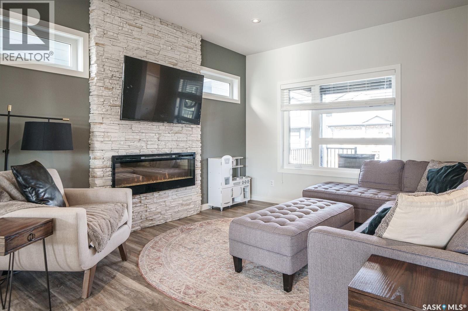 359 Marlatte Street, Saskatoon, SK - Indoor Photo Showing Living Room With Fireplace