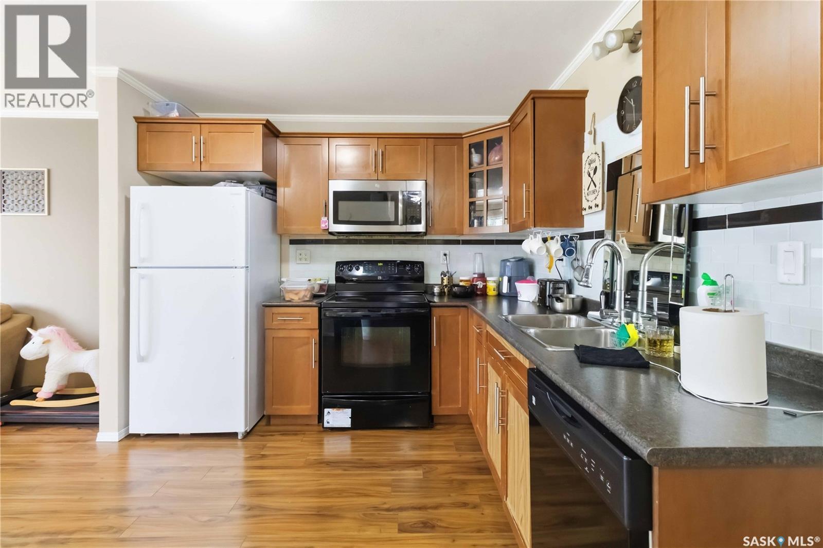 115 1303 Richardson Road, Saskatoon, SK - Indoor Photo Showing Kitchen With Double Sink