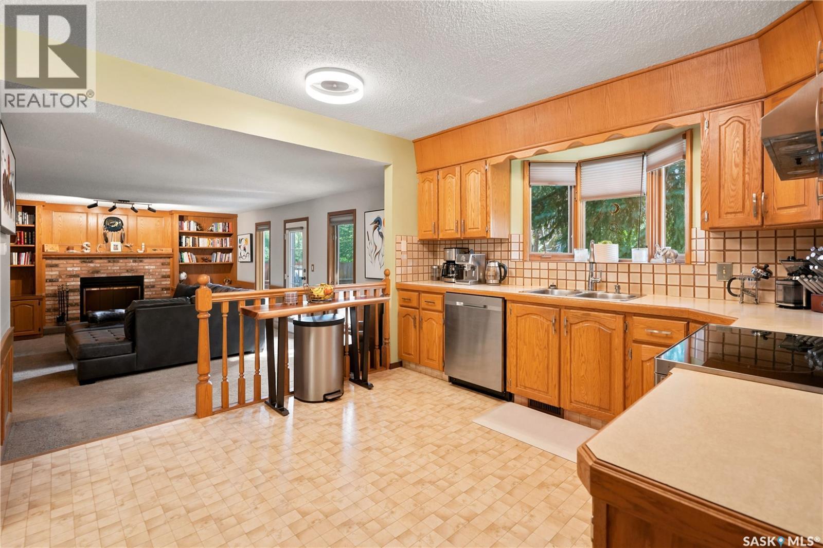 2734 Poplar Place E, Regina, SK - Indoor Photo Showing Kitchen With Double Sink