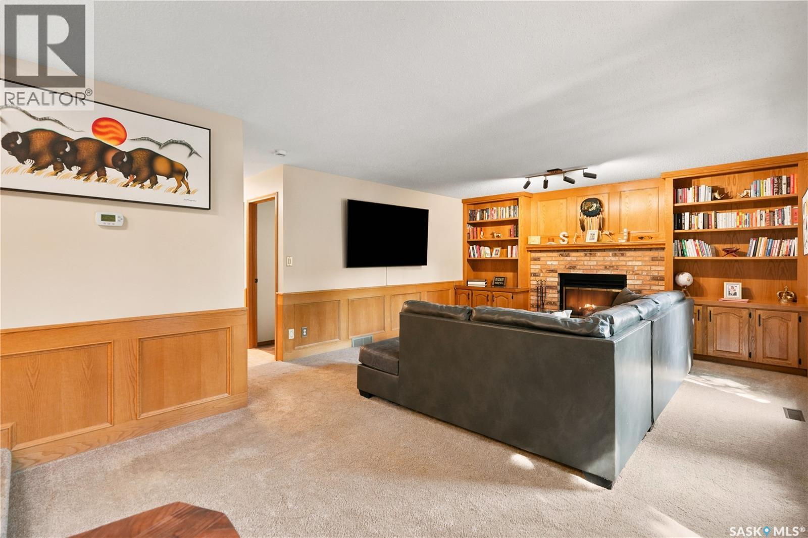 2734 Poplar Place E, Regina, SK - Indoor With Fireplace