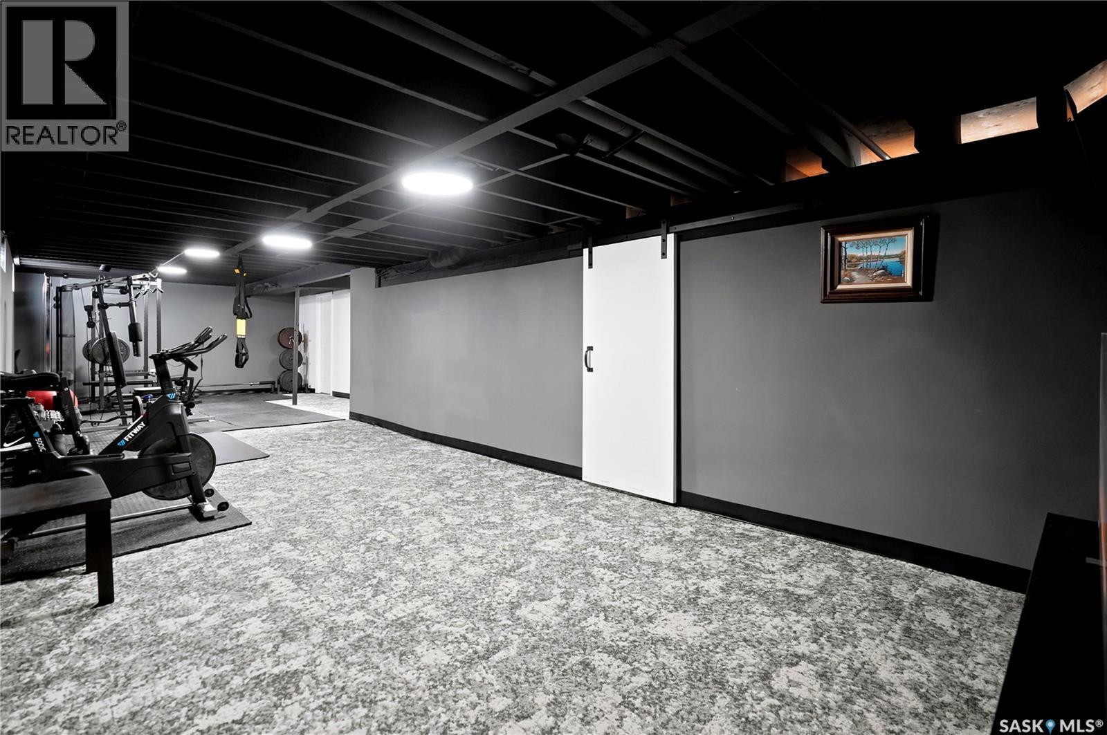 2734 Poplar Place E, Regina, SK - Indoor Photo Showing Gym Room
