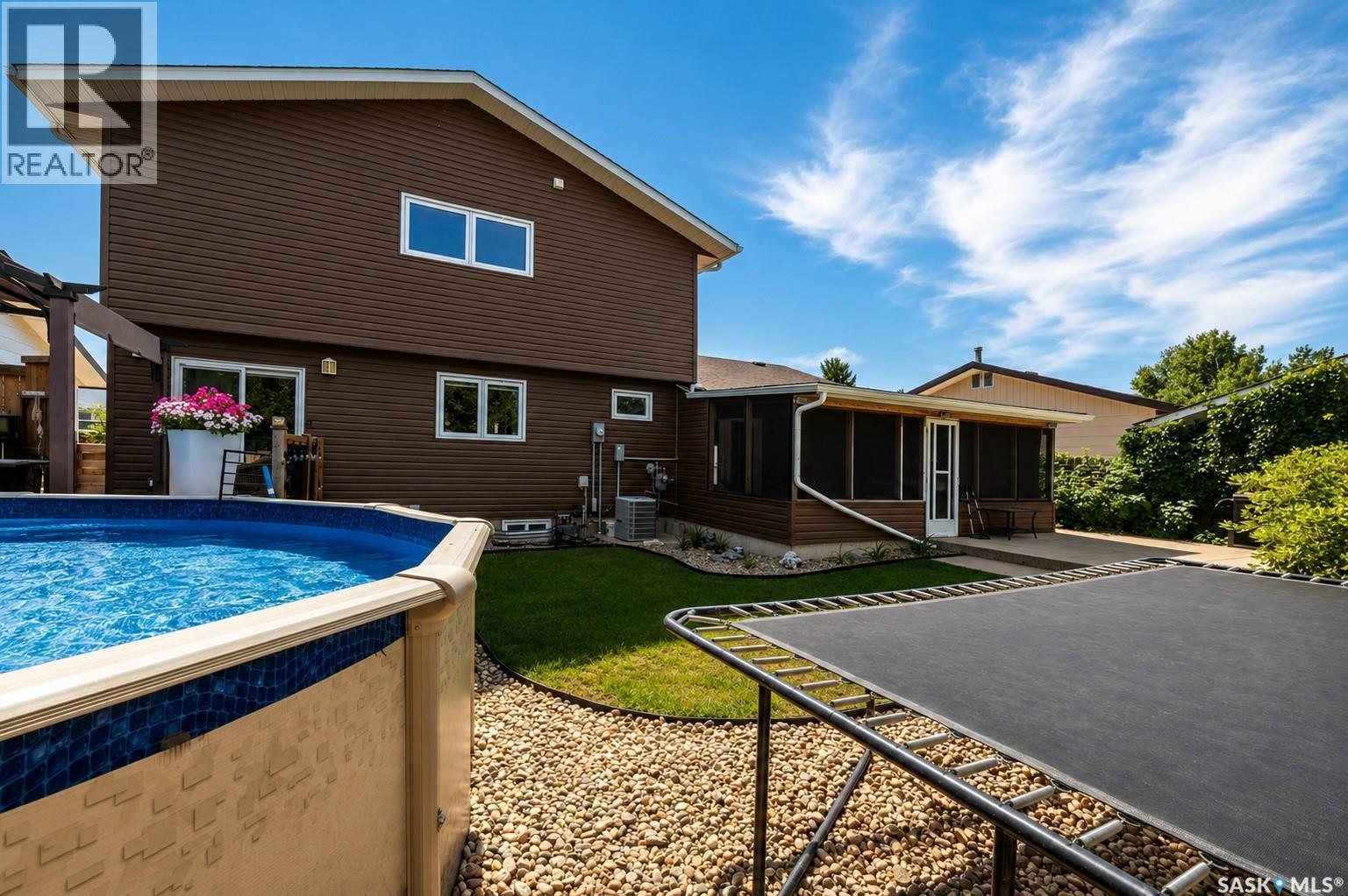 1259 Maybery Crescent, Moose Jaw, SK - Outdoor With Above Ground Pool