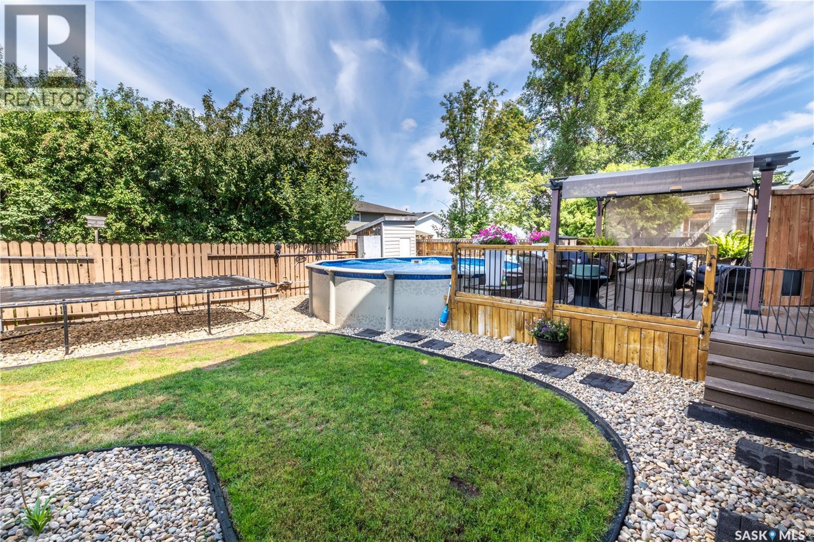 1259 Maybery Crescent, Moose Jaw, SK - Outdoor With Above Ground Pool