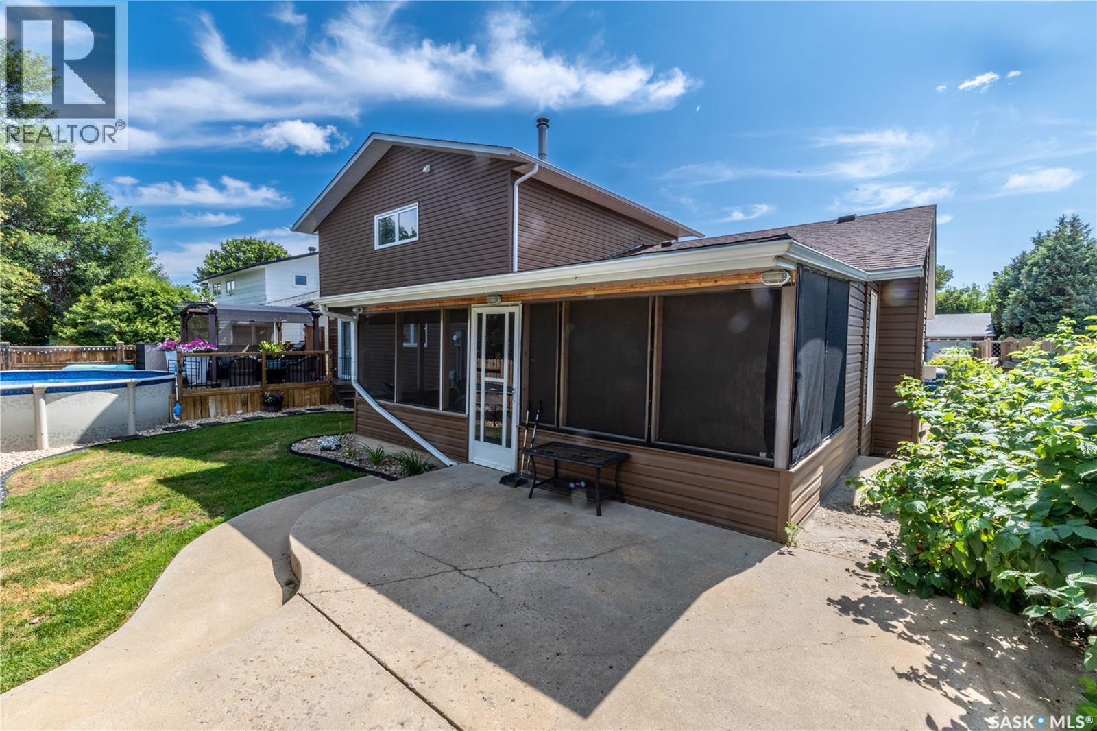 1259 Maybery Crescent, Moose Jaw, SK - Outdoor With Above Ground Pool With Exterior