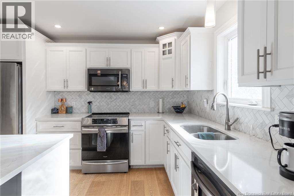 50 Walker Crescent, Hampton, NB - Indoor Photo Showing Kitchen With Stainless Steel Kitchen With Double Sink With Upgraded Kitchen