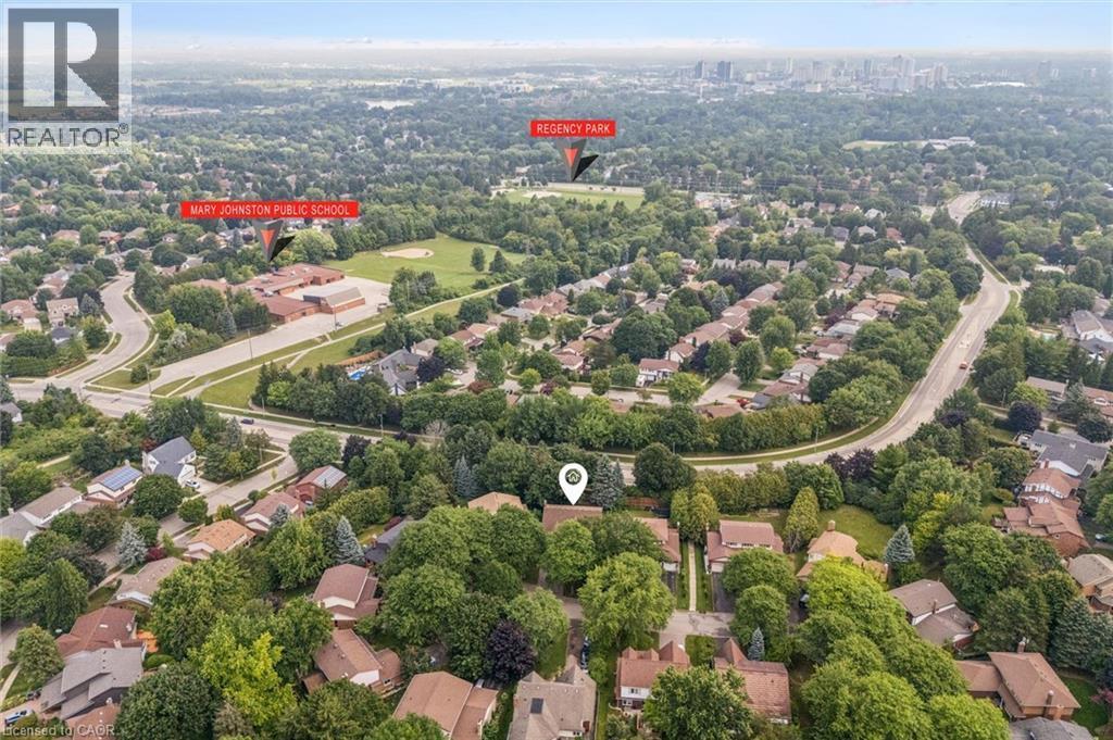 Aerial perspective showcasing a residential area with mature trees - 119 Sandy Ridge Place, Waterloo, ON - Outdoor With View