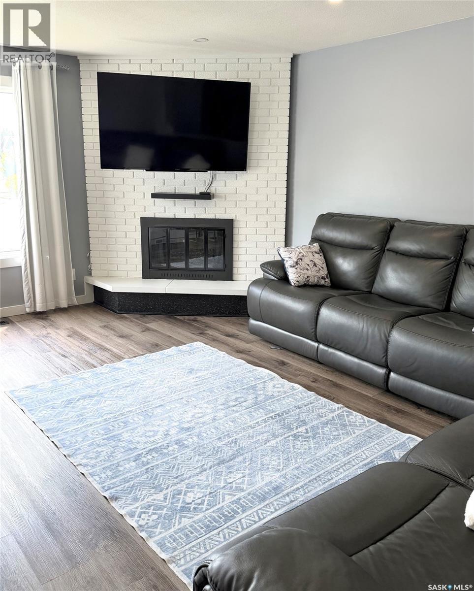 510 Redberry Road, Saskatoon, SK - Indoor Photo Showing Living Room With Fireplace