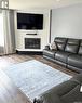 510 Redberry Road, Saskatoon, SK  - Indoor Photo Showing Living Room With Fireplace 