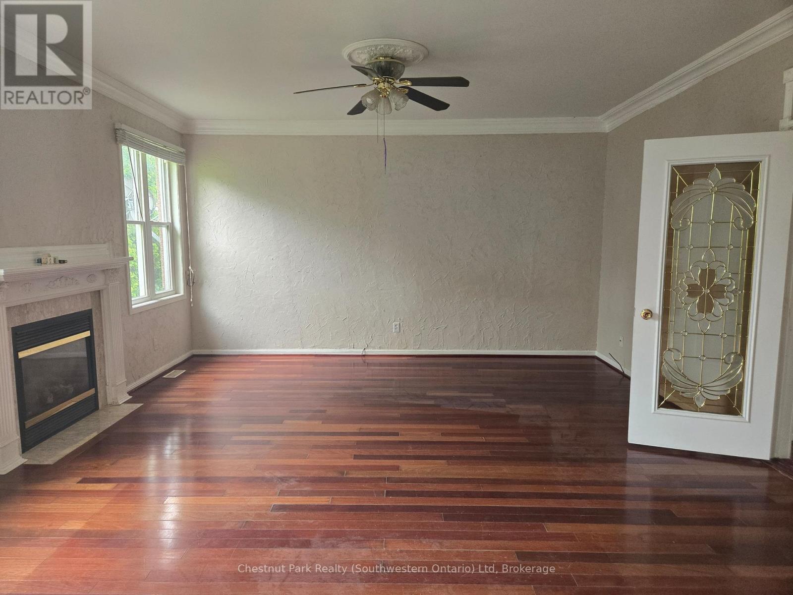 Another living room with cozy fireplace - 147 Baggs Crescent, Cambridge, ON - Indoor With Fireplace