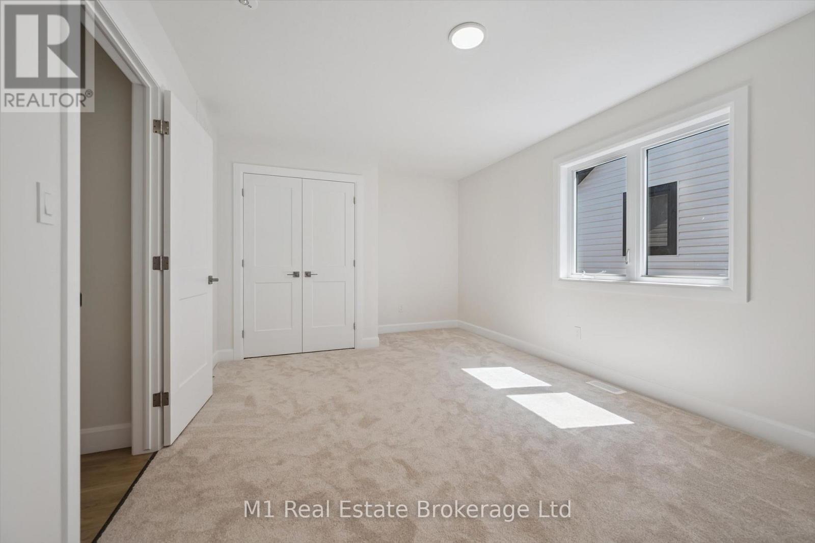 74 Bedell Drive, Mapleton, ON - Indoor Photo Showing Other Room