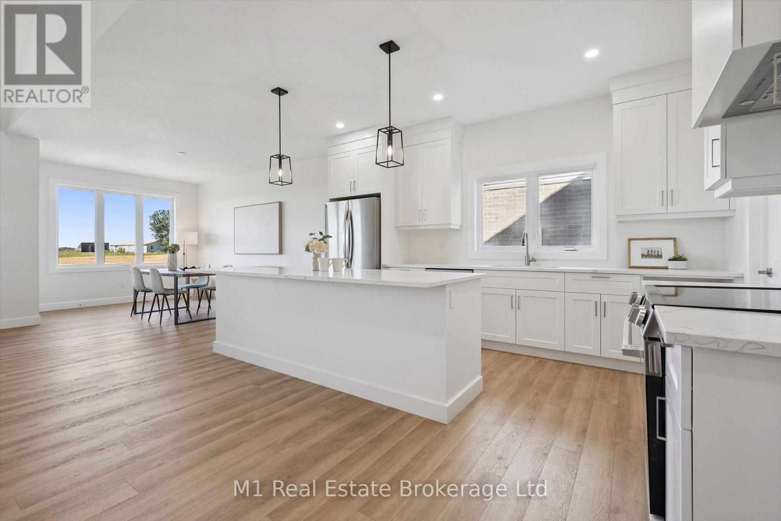 74 Bedell Drive, Mapleton, ON - Indoor Photo Showing Kitchen With Upgraded Kitchen