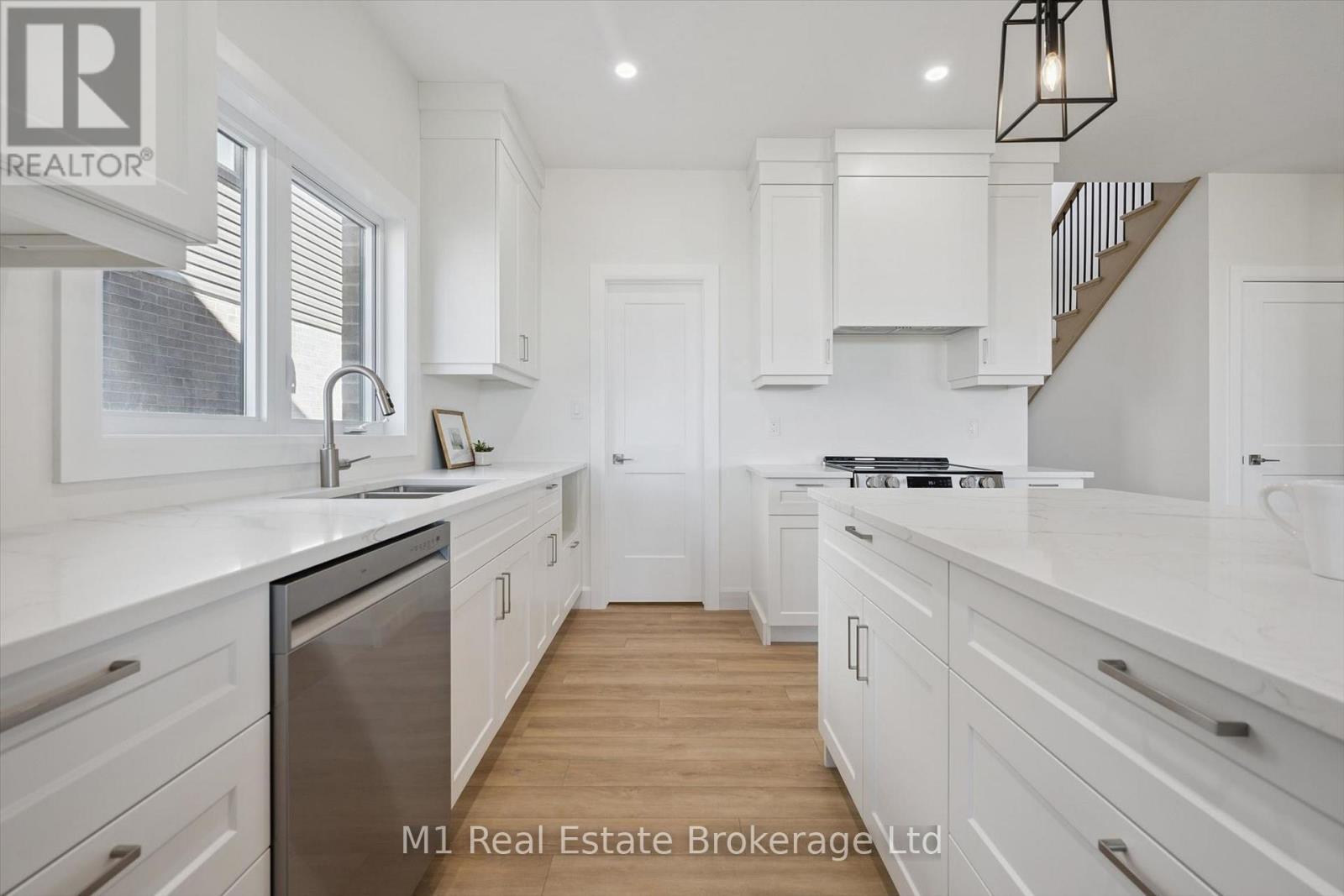 74 Bedell Drive, Mapleton, ON - Indoor Photo Showing Kitchen With Upgraded Kitchen