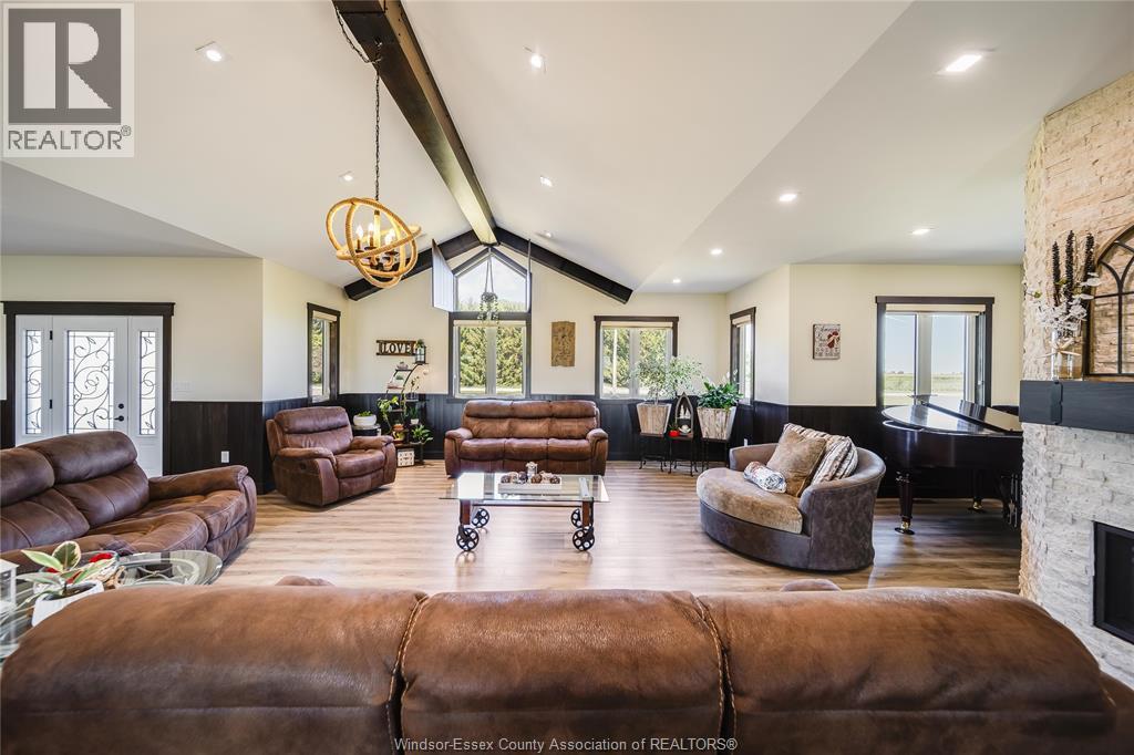 1764 Third Concession Line, Wheatley, ON - Indoor Photo Showing Living Room With Fireplace