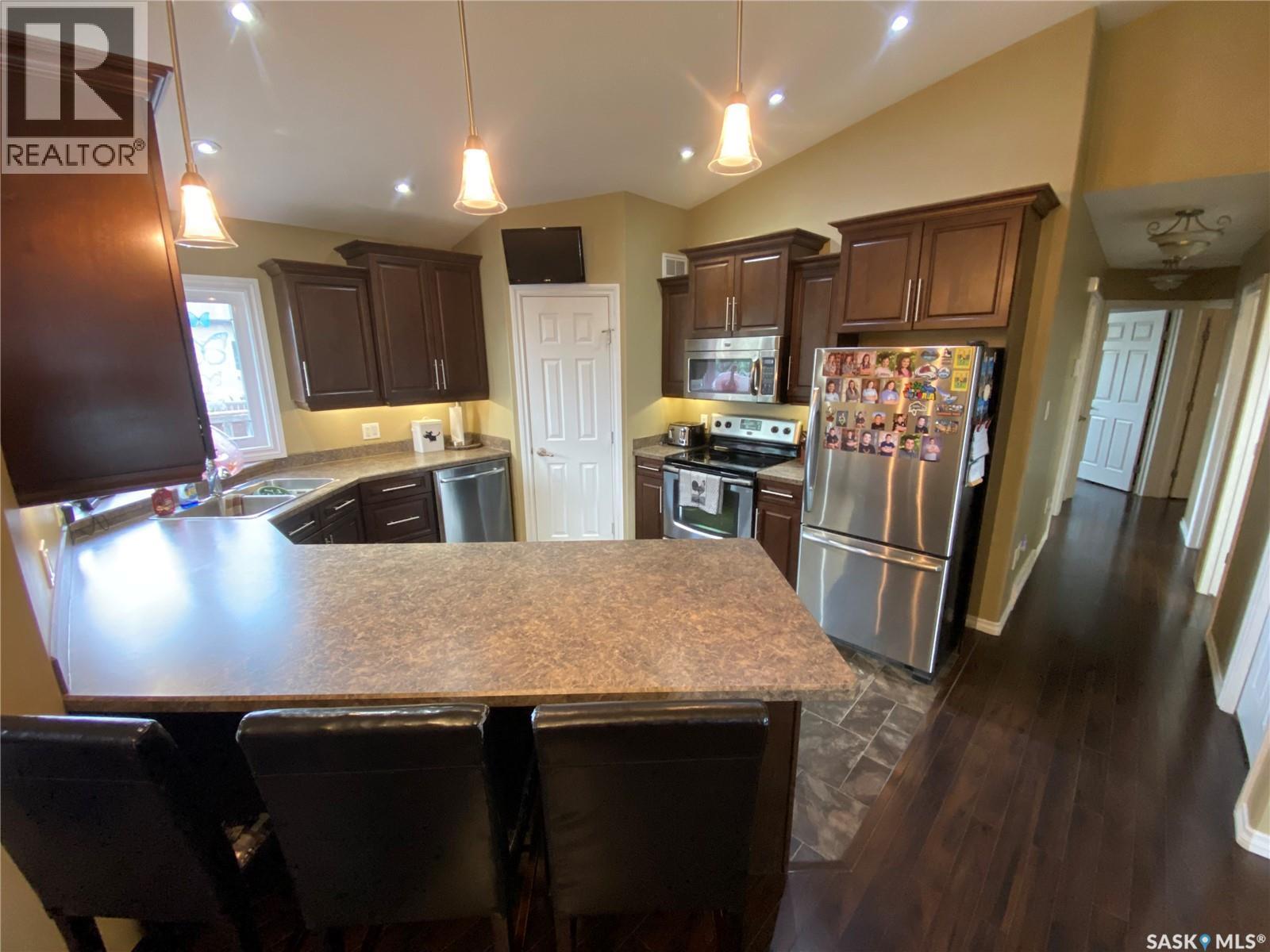 54 Madge Way, Yorkton, SK - Indoor Photo Showing Kitchen With Double Sink