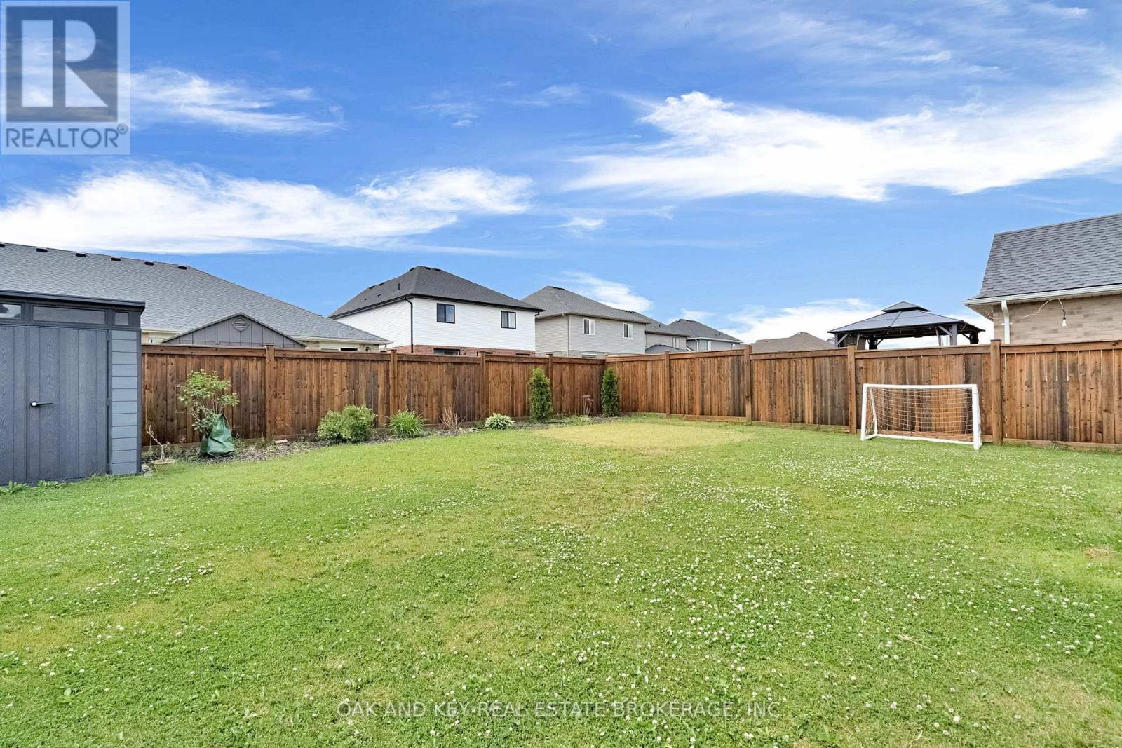 Fully fenced backyard. - 48 Ambrosia Path, St. Thomas, ON - Outdoor