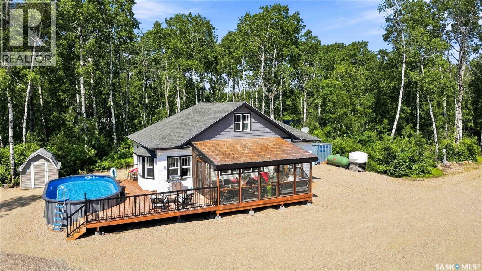 501 Coner Heights, Barrier Lake, SK - Outdoor With Above Ground Pool With Deck Patio Veranda