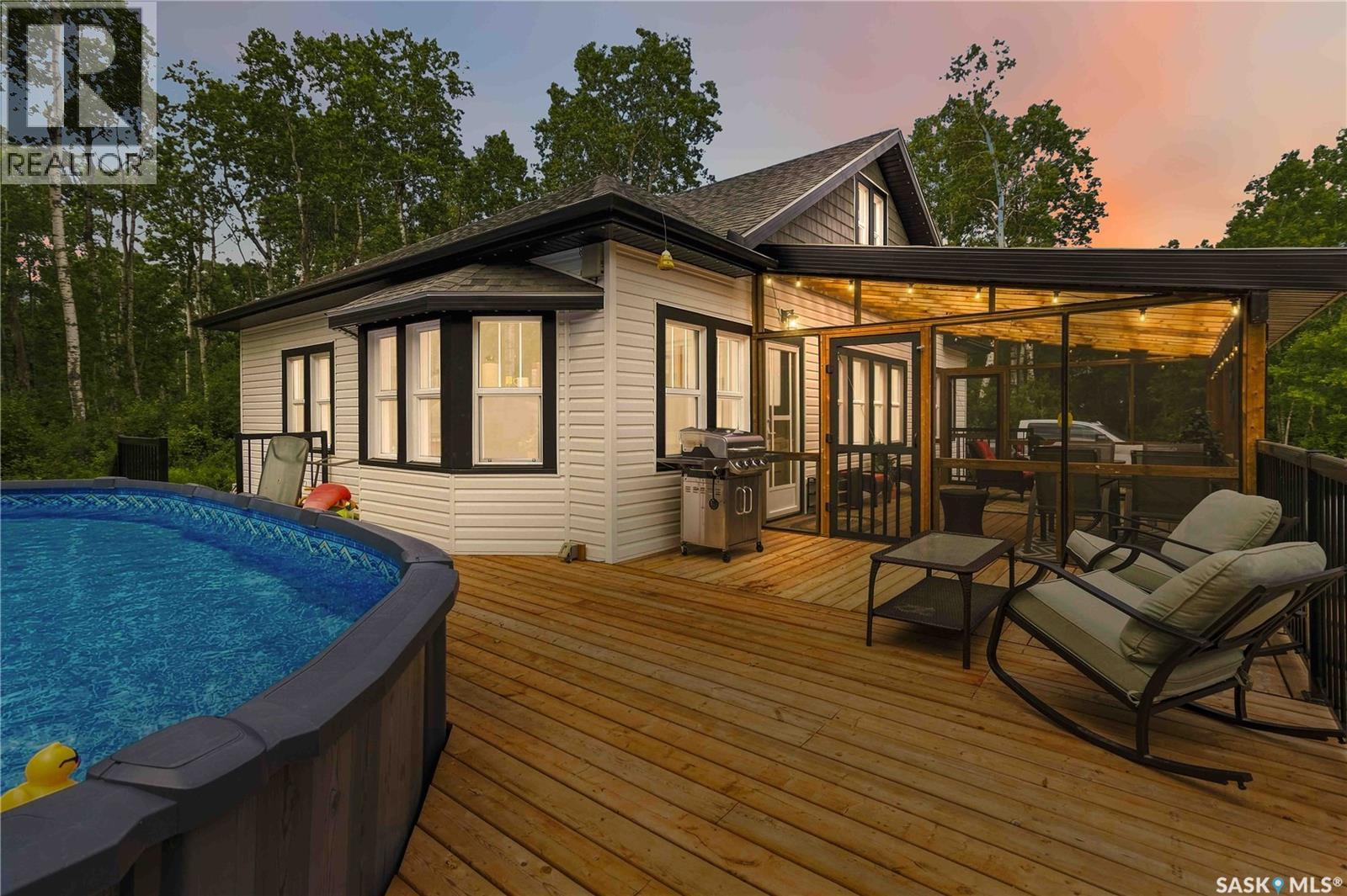 501 Coner Heights, Barrier Lake, SK - Outdoor With Above Ground Pool With Deck Patio Veranda With Exterior