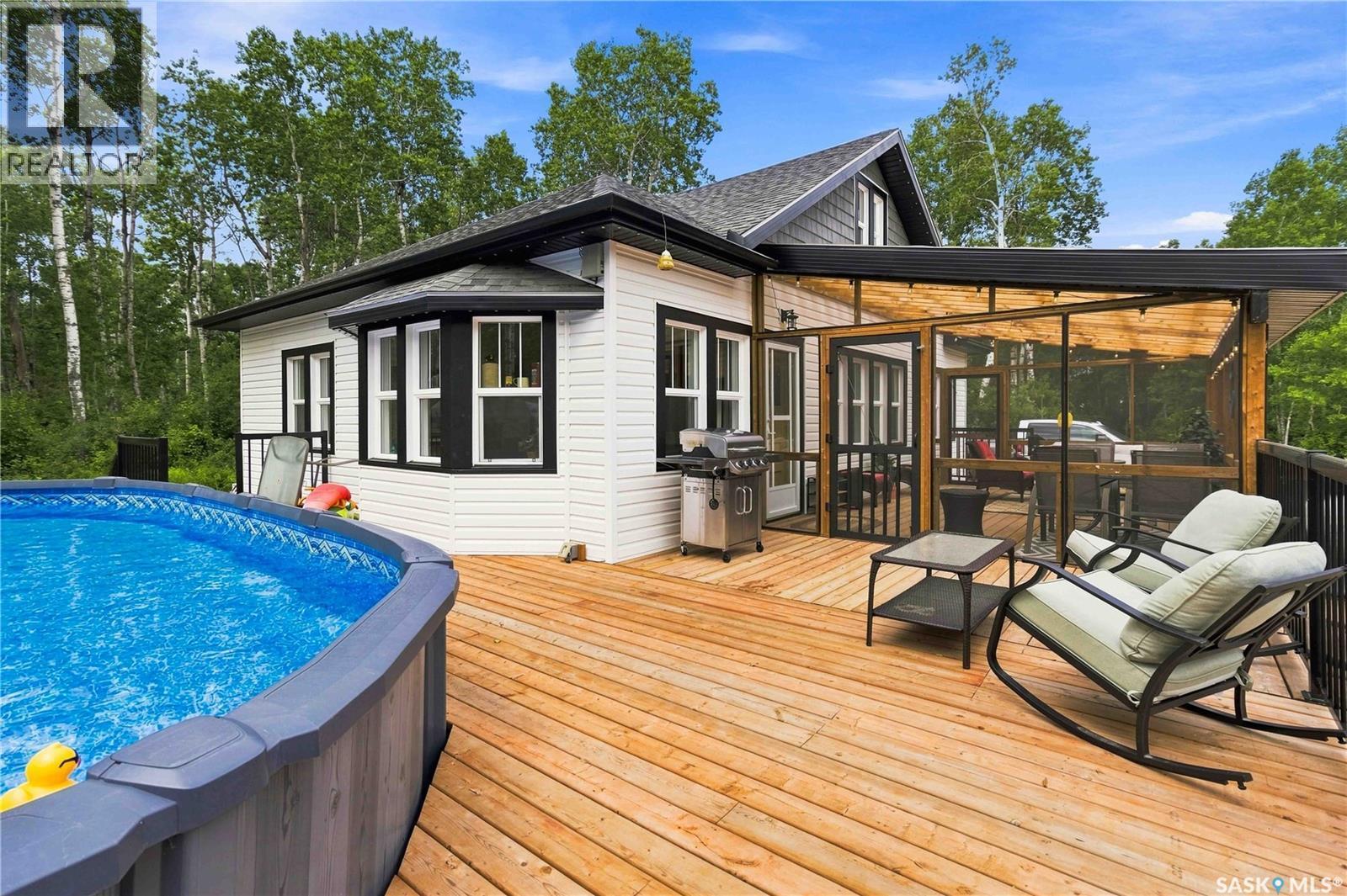 501 Coner Heights, Barrier Lake, SK - Outdoor With Above Ground Pool With Deck Patio Veranda With Exterior
