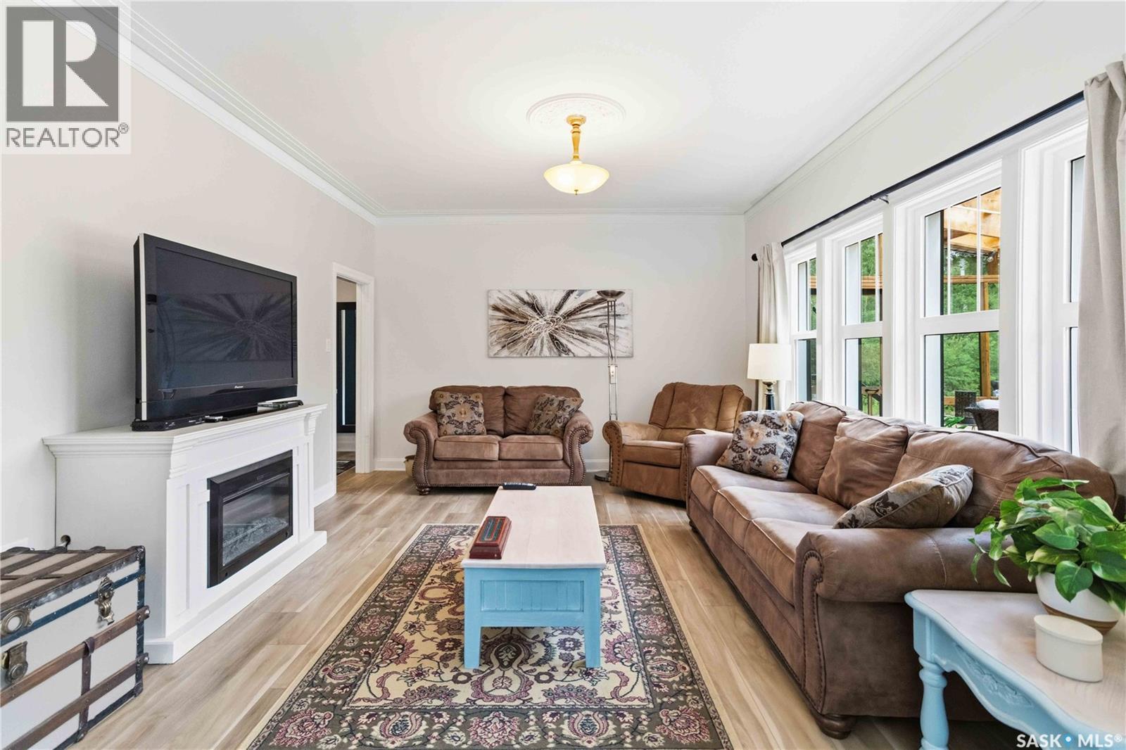 501 Coner Heights, Barrier Lake, SK - Indoor Photo Showing Living Room With Fireplace