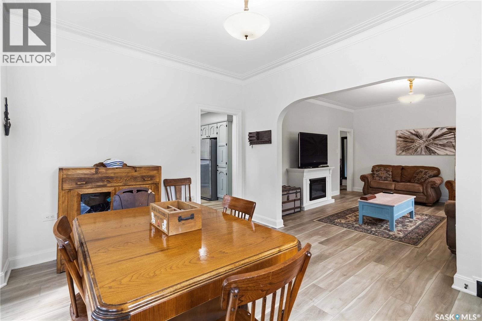 501 Coner Heights, Barrier Lake, SK - Indoor Photo Showing Dining Room With Fireplace
