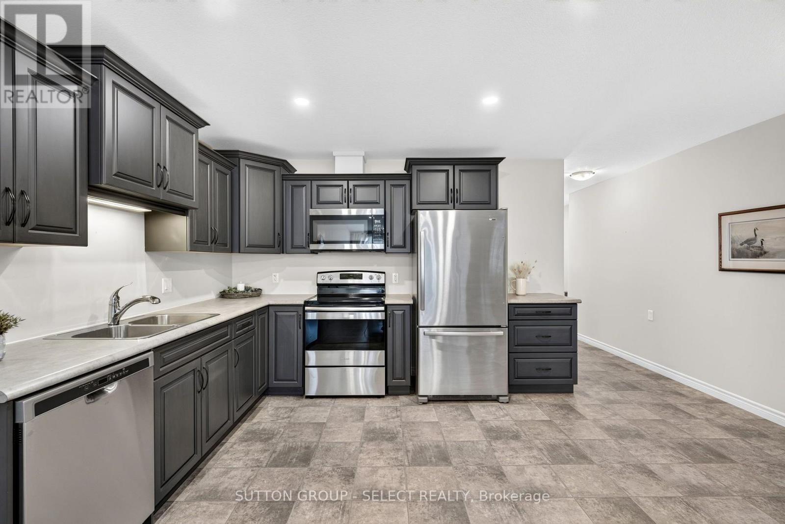 14 Devon Drive, South Huron (Exeter), ON - Indoor Photo Showing Kitchen With Stainless Steel Kitchen With Double Sink