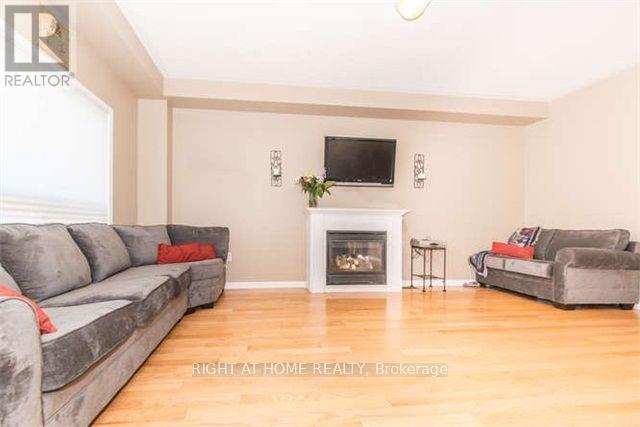 780 Ormond Drive, Oshawa, ON - Indoor Photo Showing Living Room With Fireplace