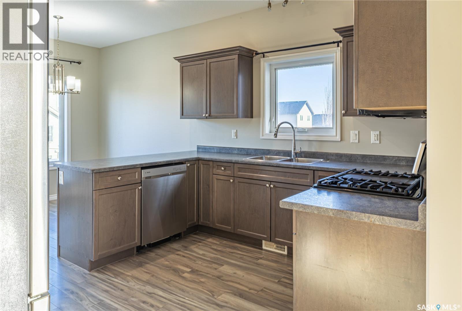 254 Macinnes Street, Saskatoon, SK - Indoor Photo Showing Kitchen With Double Sink