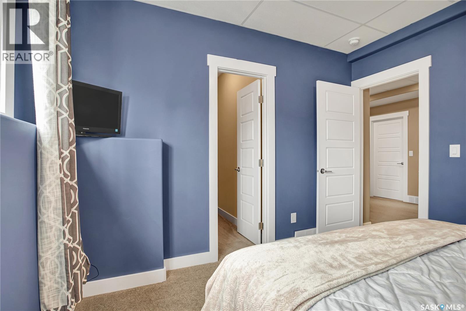 6F 110 Centennial Boulevard, Warman, SK - Indoor Photo Showing Bedroom