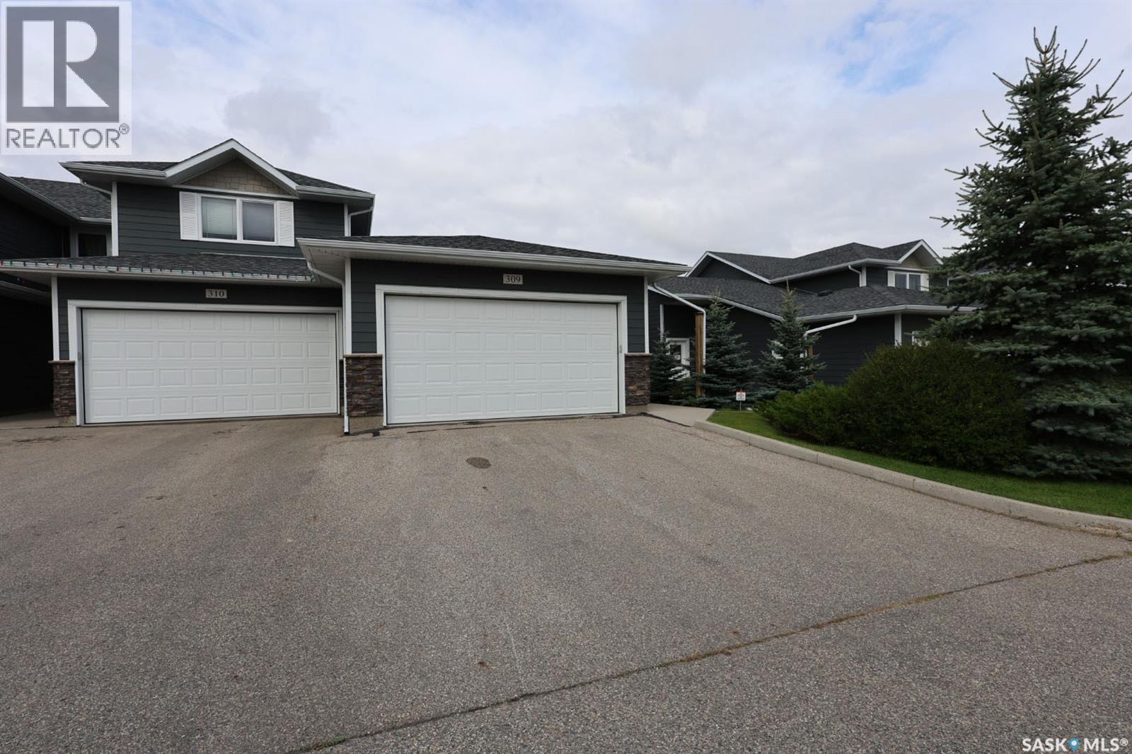 309 1851 Pederson Drive, Prince Albert, SK - Outdoor With Facade