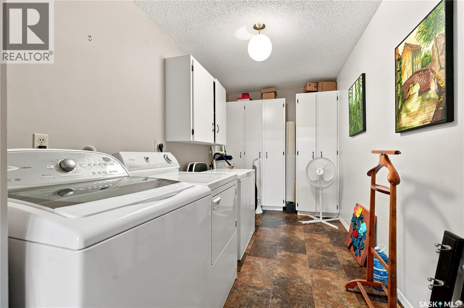 208 410 Main Street, Saskatoon, SK - Indoor Photo Showing Laundry Room