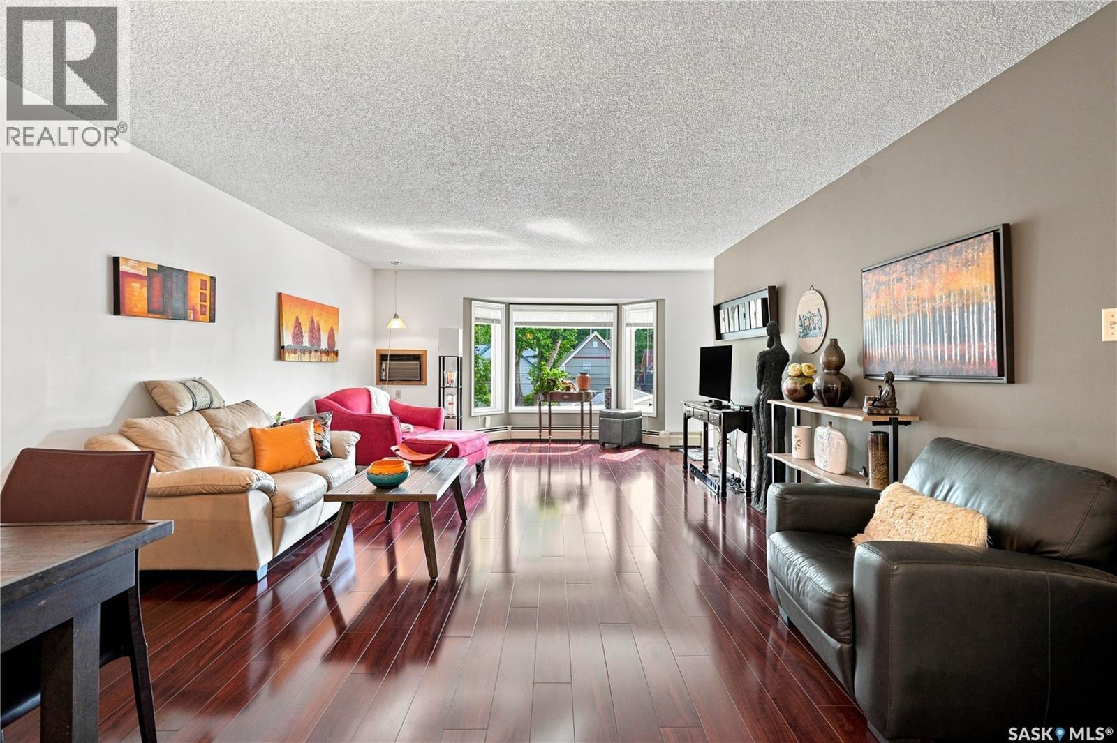 208 410 Main Street, Saskatoon, SK - Indoor Photo Showing Living Room