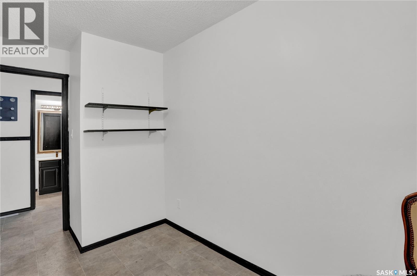 302 Doiron Road N, Regina, SK - Indoor Photo Showing Other Room