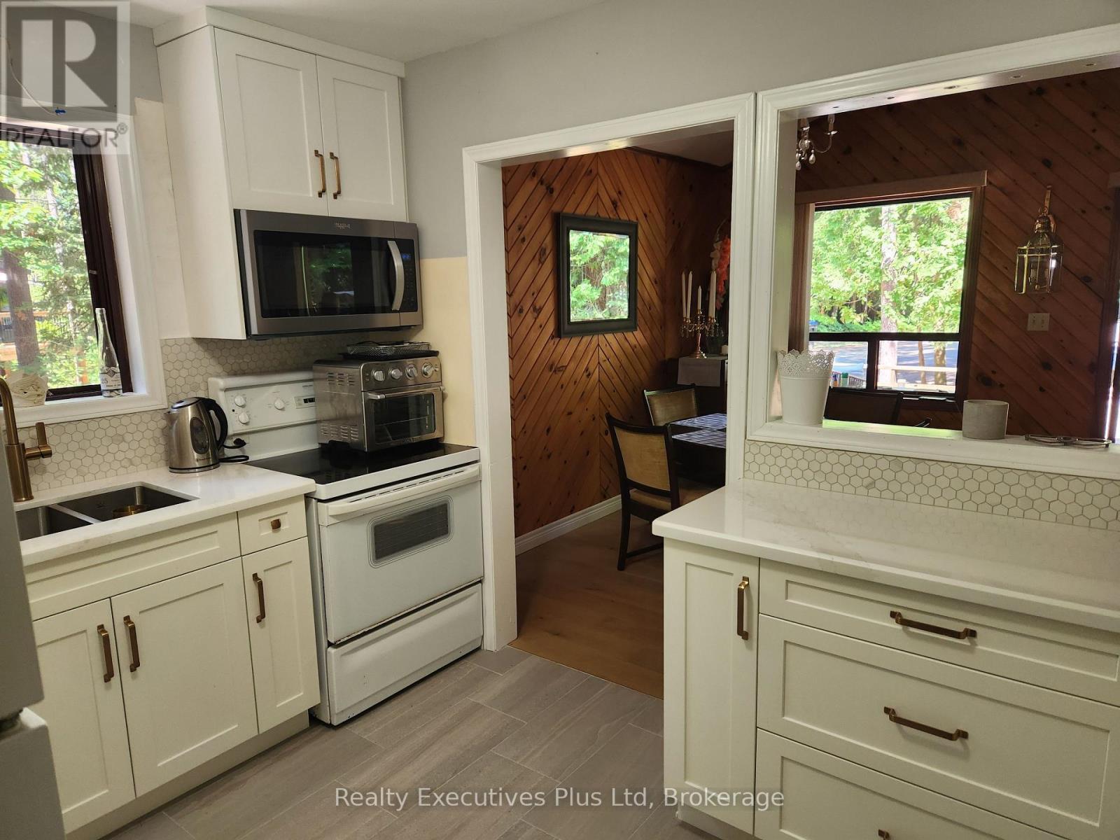 Kitchen - 2 Zelia Court, Tiny, ON - Indoor Photo Showing Kitchen With Double Sink