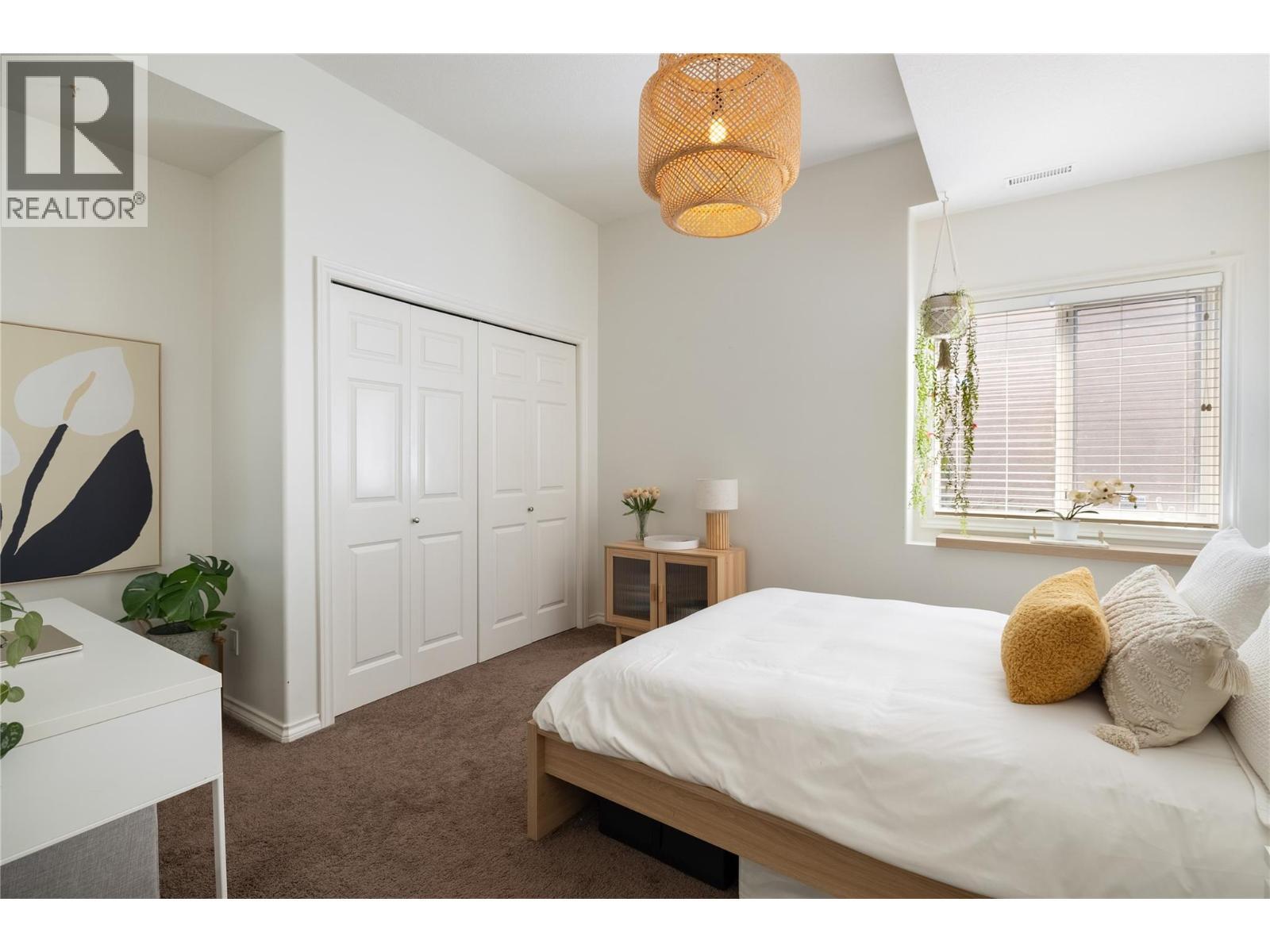 10 Bayview Heights, Coldstream, BC - Indoor Photo Showing Bedroom