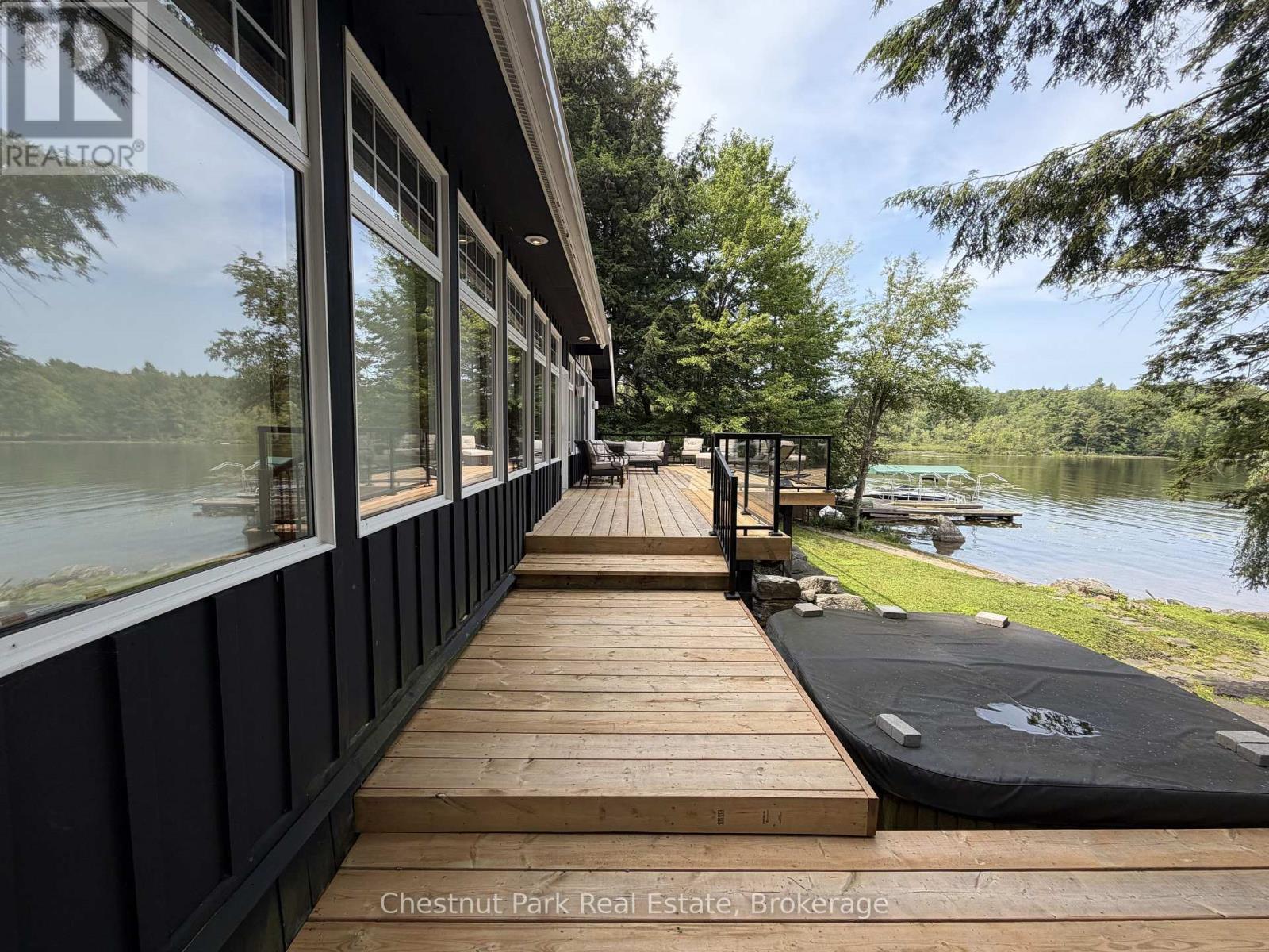 1002 Ahmic Drive N, Muskoka Lakes (Medora), ON - Outdoor With Body Of Water