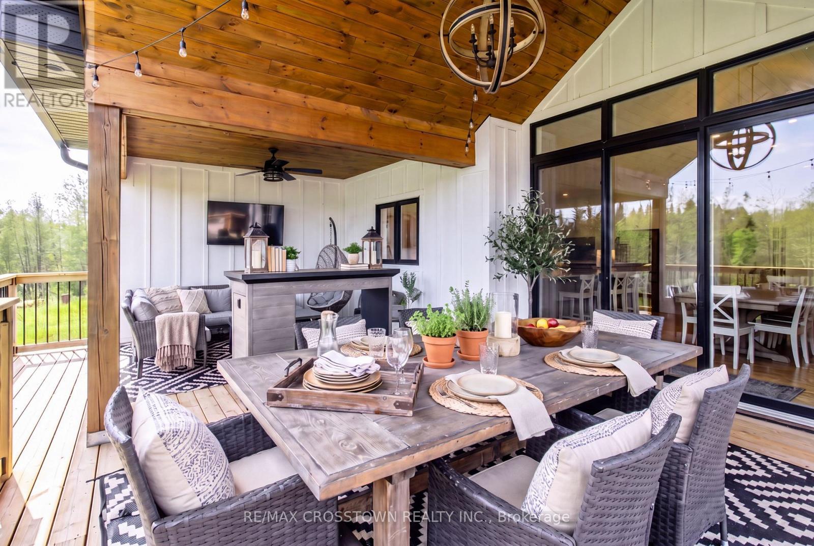 Covered Upper Back Deck - 75 Moonstone Road E, Oro-Medonte, ON - Indoor Photo Showing Dining Room