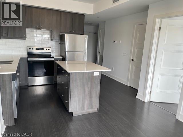 255 E Northfield Drive E Unit# 609, Waterloo, ON - Indoor Photo Showing Kitchen With Stainless Steel Kitchen With Double Sink With Upgraded Kitchen