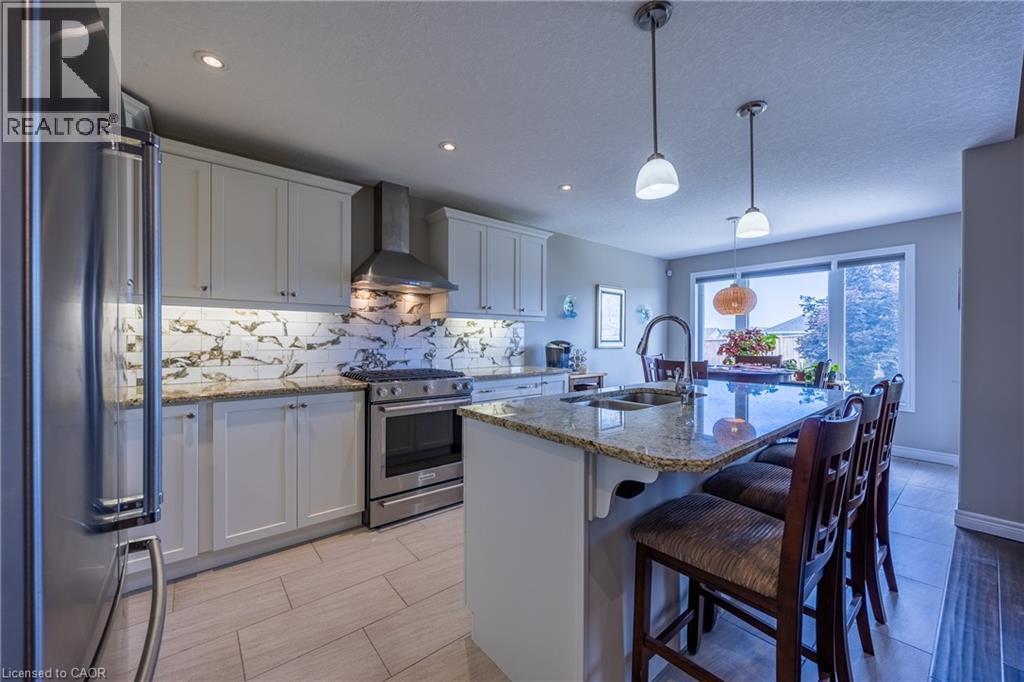 7 Stonebridge Place, Simcoe, ON - Indoor Photo Showing Kitchen With Stainless Steel Kitchen With Double Sink With Upgraded Kitchen