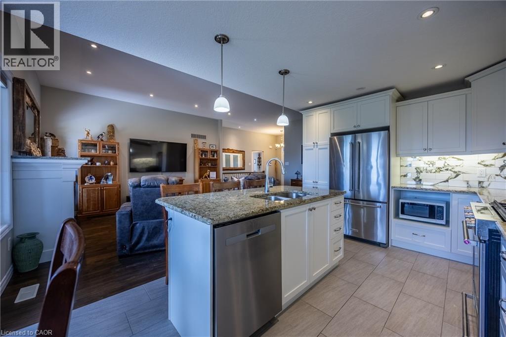7 Stonebridge Place, Simcoe, ON - Indoor Photo Showing Kitchen With Stainless Steel Kitchen With Double Sink With Upgraded Kitchen