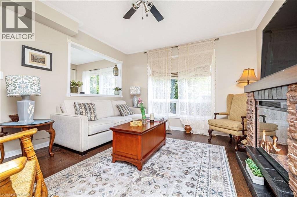 619 Porter Way, Milton, ON - Indoor Photo Showing Living Room With Fireplace