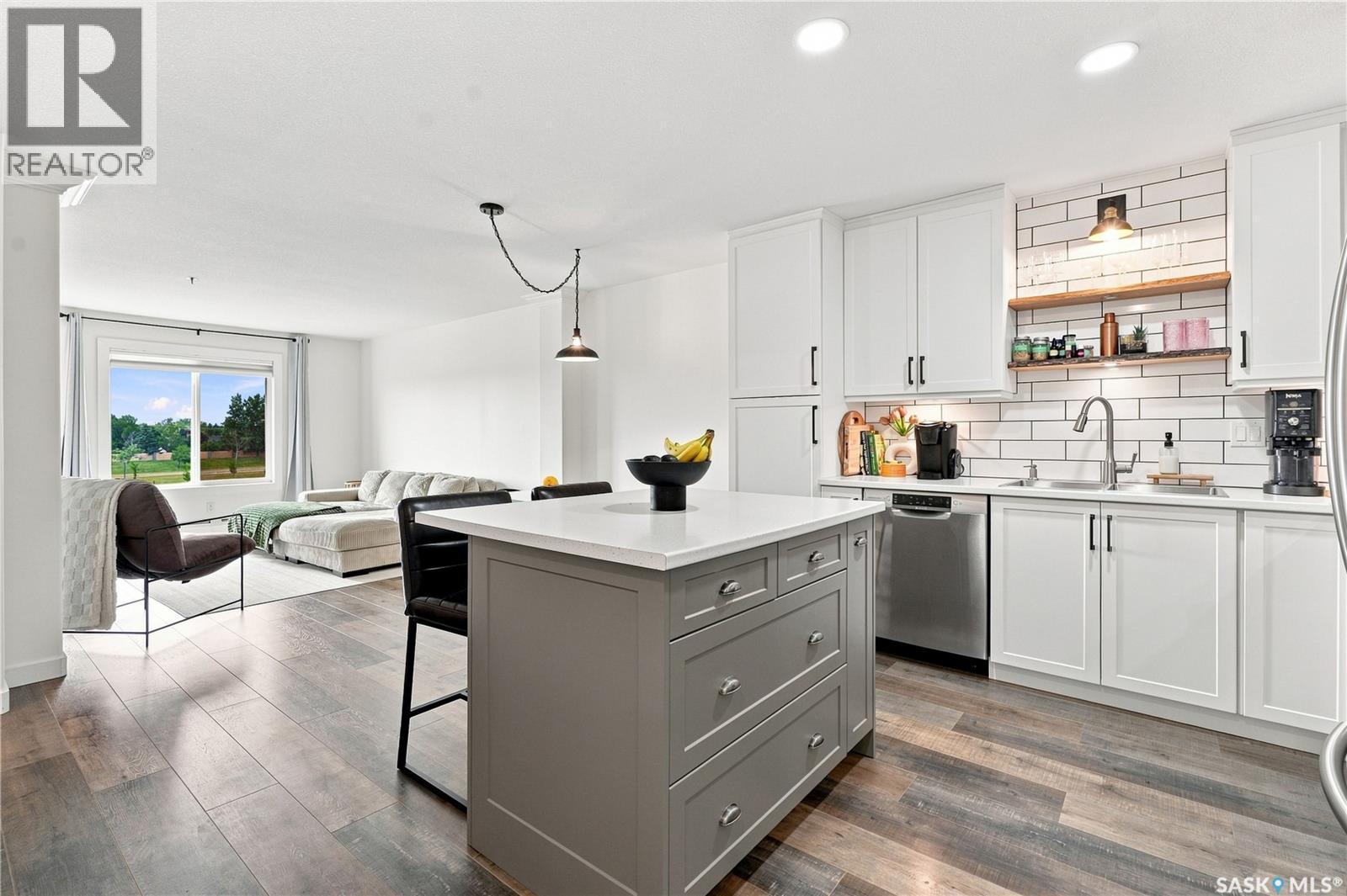 301 235 Herold Terrace, Saskatoon, SK - Indoor Photo Showing Kitchen With Stainless Steel Kitchen With Upgraded Kitchen