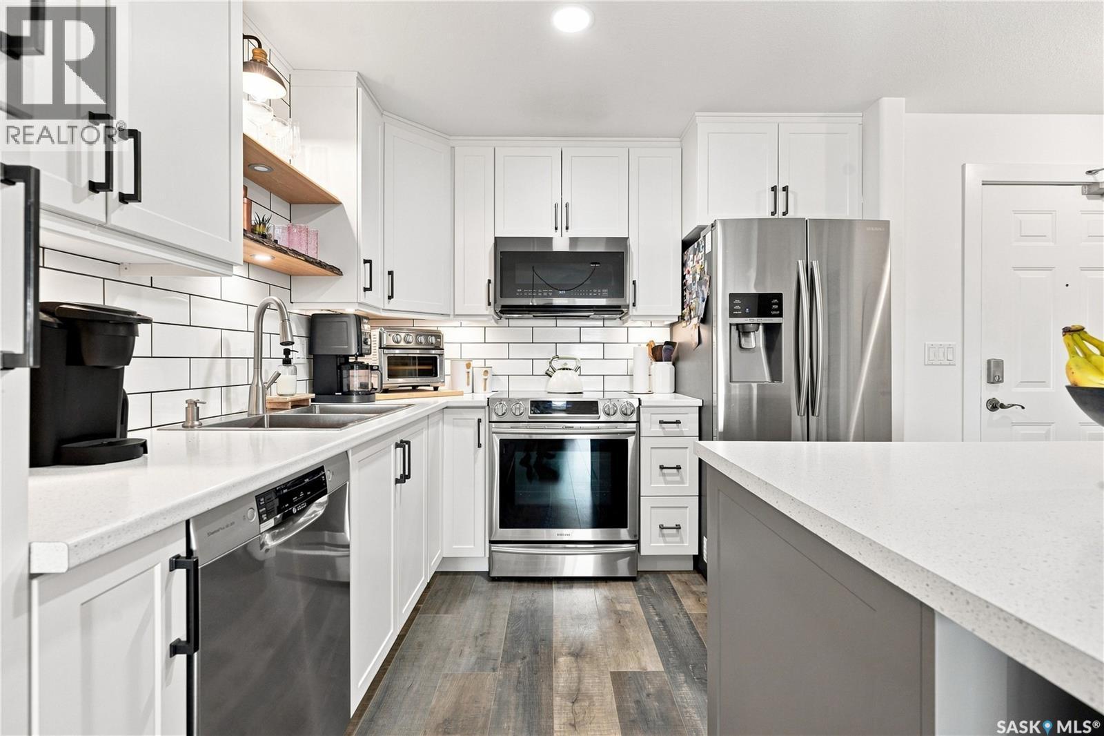 301 235 Herold Terrace, Saskatoon, SK - Indoor Photo Showing Kitchen With Stainless Steel Kitchen With Double Sink With Upgraded Kitchen