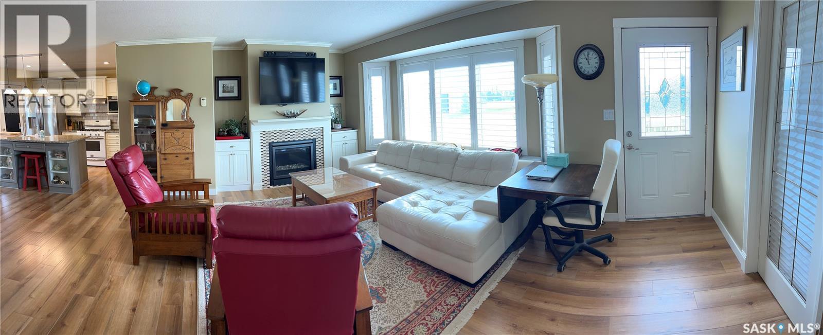 Dew Acreage, Estevan Rm No. 5, SK - Indoor Photo Showing Living Room With Fireplace