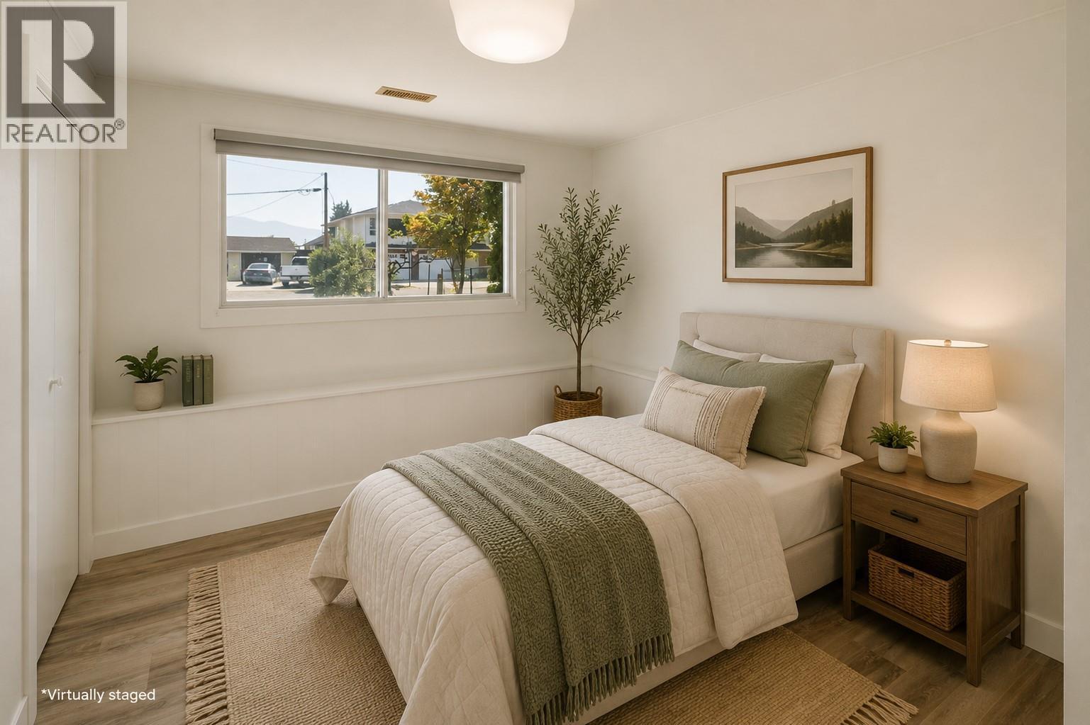 *Virtually staged - 1284 Mcbride Road, Kelowna, BC - Indoor Photo Showing Bedroom