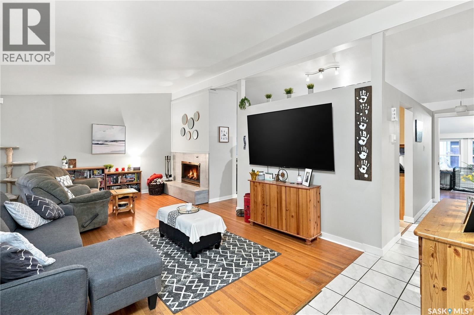 13 Anderson Avenue, Regina, SK - Indoor Photo Showing Living Room With Fireplace