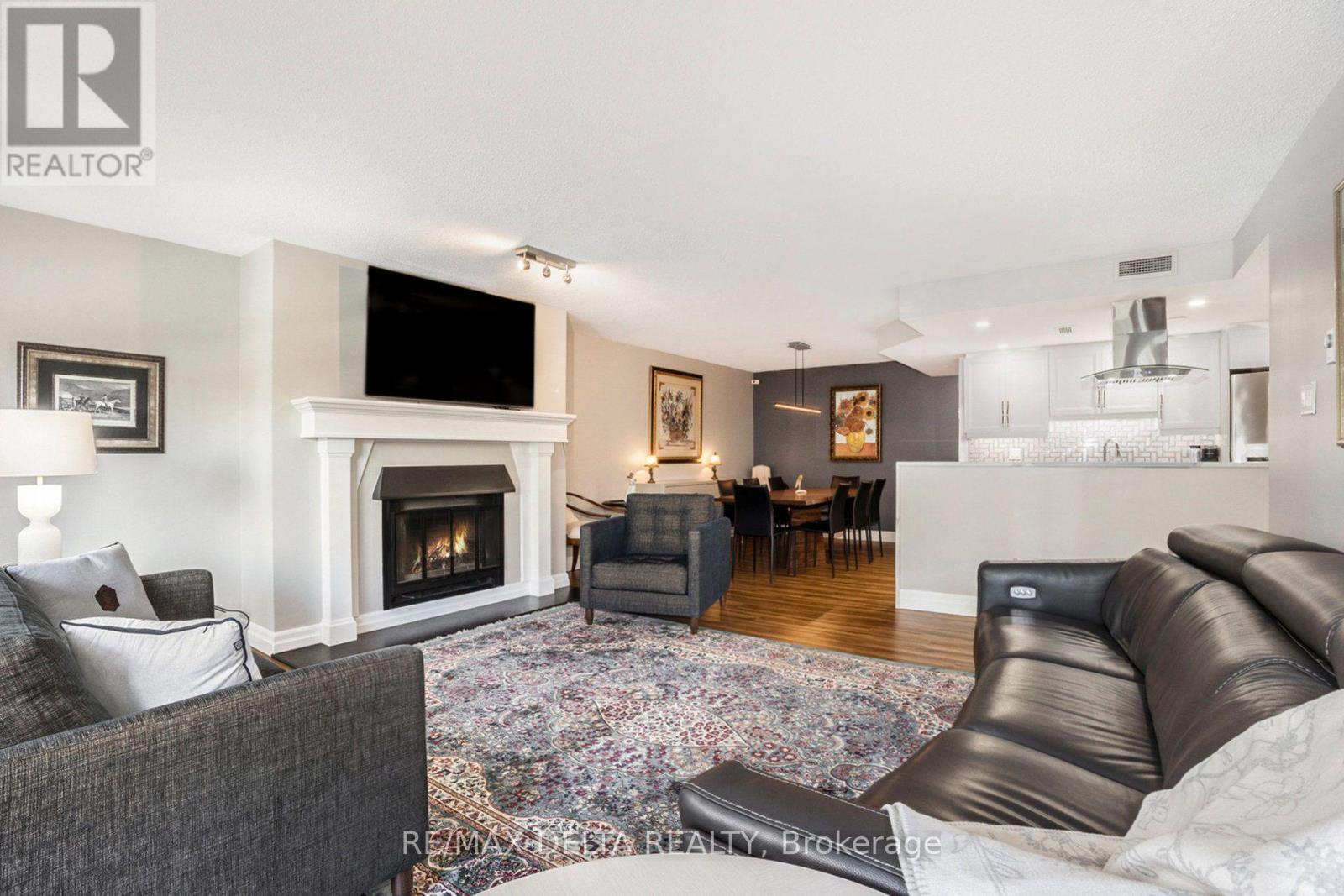 304 - 295 Gilmour Street, Ottawa, ON - Indoor Photo Showing Living Room With Fireplace